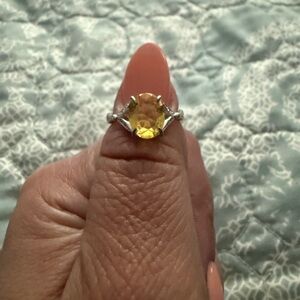 Elegant Silver and Yellow Gemstone Ring